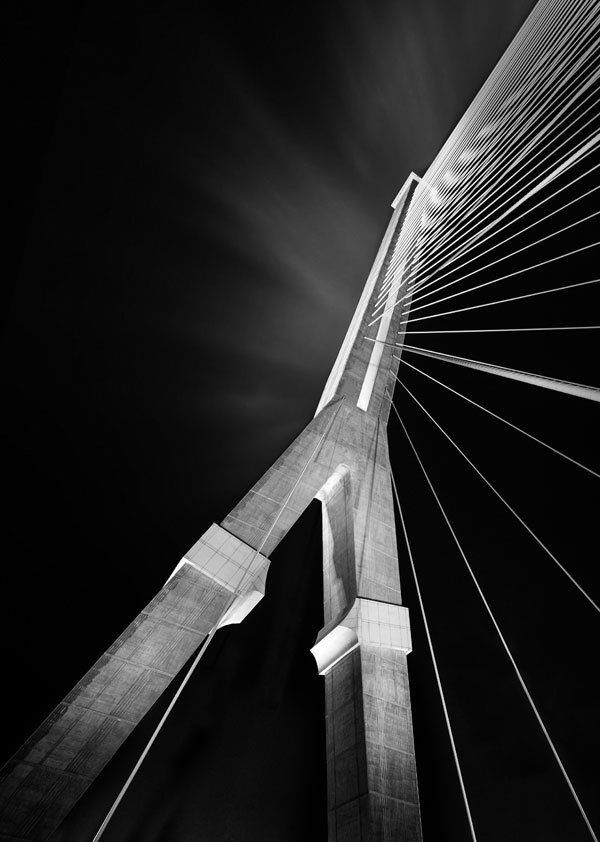 Black and white fine art photography of Rama 8 Bridge in Bangkok, Thailand.