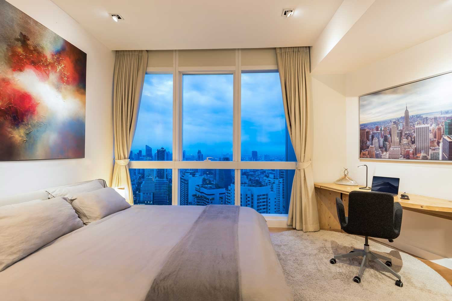Luxury real estate photo of a set up dining table in a luxury penthouse at Emporium Suites in Bangkok, Thailand.