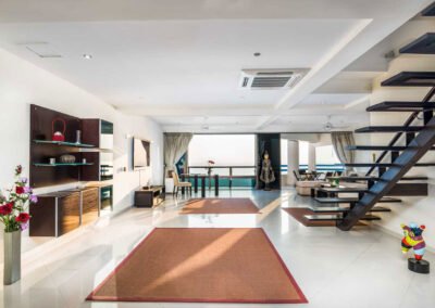Living room of a modern duplex apartment in Pattaya. Interior photo by Real Estate Photography Thailand.