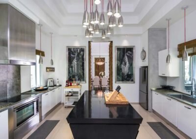 Modern kitchen at a villa in Pattaya. Interior photo captured by Real Estate Photography Thailand.
