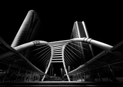 Iconic bridge at Chong Nonsi Intersection in downtown Bangkok. Black and white architecture photography.