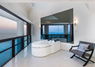 Property photography of a balcony with jacuzzi at the Plaza Condominium Pattaya.