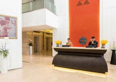 Modern hotel reception with floral decor. Hotel and lifestyle photography capture by commercial photographer based in Bangkok, Thailand.