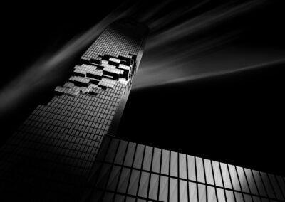Black and white architecture photography of the Mahanarkhon Tower in Bangkok, Thailand.