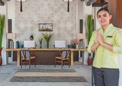 Modern hotel reception with welcoming staff. Hotel and lifestyle photography service in Bangkok, Thailand.