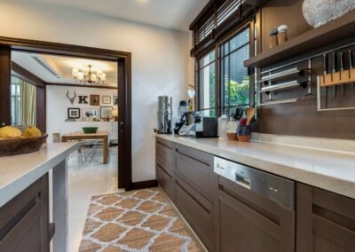 Kitchen in a pool villa in Bangkok, captured by professionals eat estate photographer in Thailand.