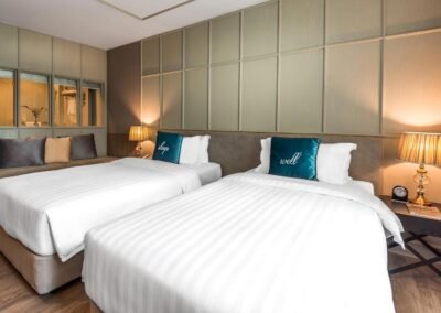 Inviting hotel room at Well Hotel in Bangkok. Hotel photography service by professional interior photographer in Thailand.